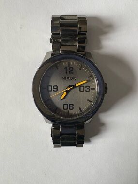 Nixon Black Stainless Steel Watch with Yellow Hands